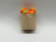 画像1: 紙袋入り果物（オレンジ） (1)